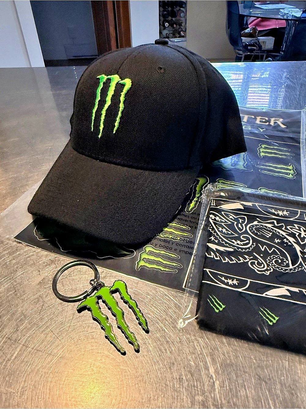 rare Monster Energy Trucker Hat with keychain and accessories